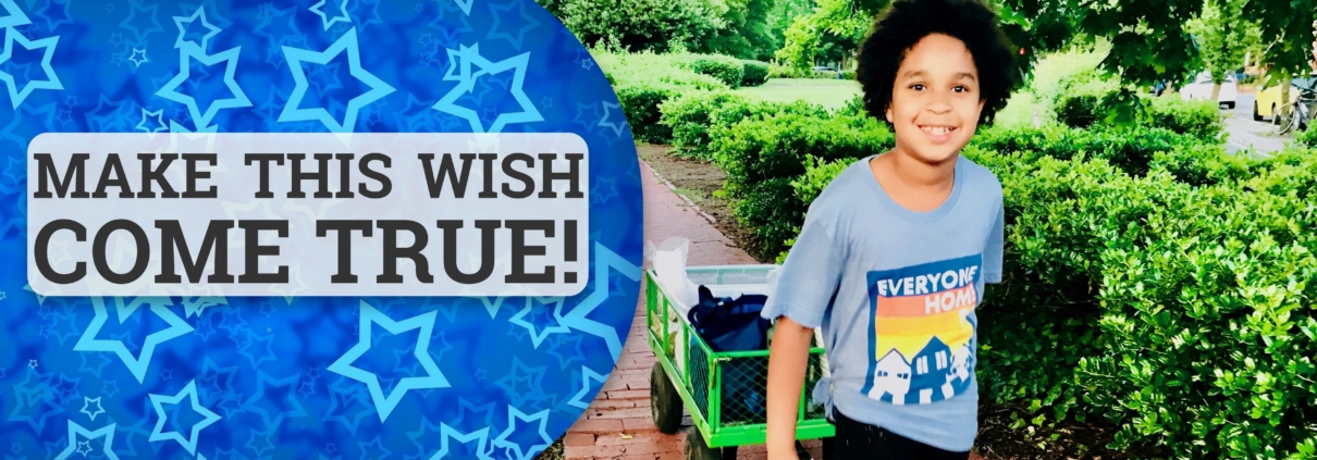 Image of Maya pulling green HART wagon with text "Make This Wish Come True"